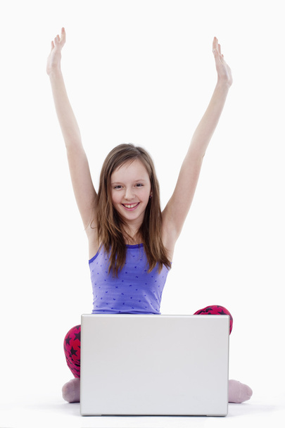 Woman with computer cheering - Photo, Image