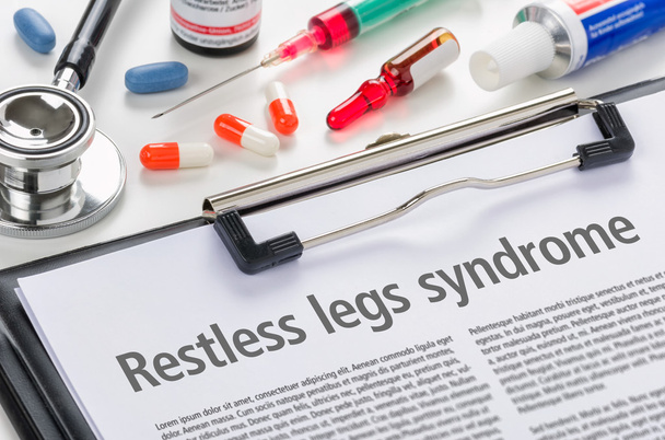 El diagnóstico Síndrome de piernas inquietas escrito en un portapapeles
 - Foto, imagen