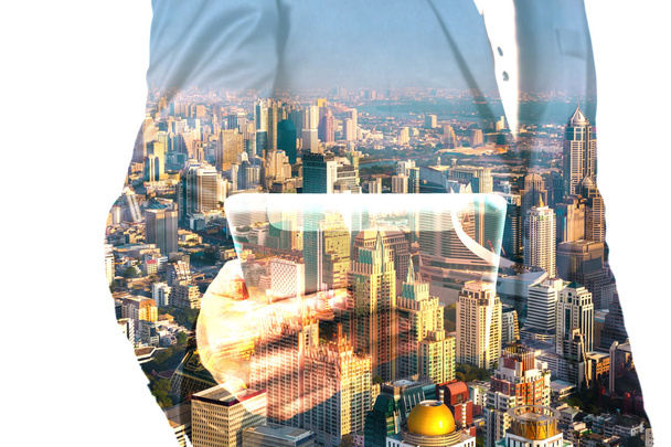 Businessman with Tablet and City of Bangkok, double exposure - Photo, Image