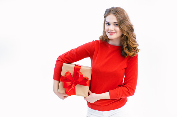 Joyful woman holding a box with gift - Fotografie, Obrázek