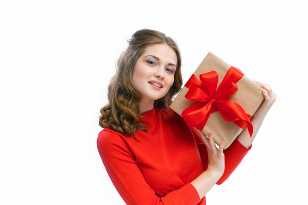 Joyful woman holding a box with gift - Fotografie, Obrázek