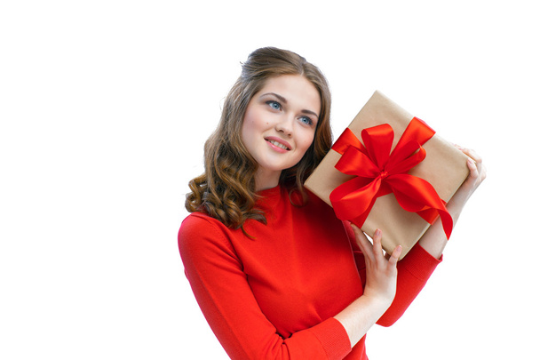 Joyful woman holding a box with gift - Valokuva, kuva