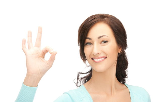 Young woman showing ok sign - Foto, Imagem