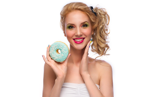 Funny joyful woman with sweets, dessert. Diet, dieting concept. - Foto, afbeelding