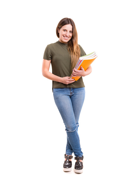 Woman carrying some books - Photo, Image