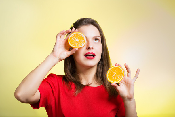 Woman with oranges - 写真・画像