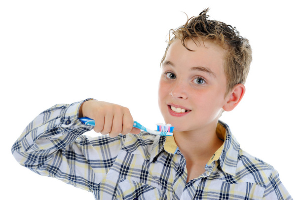 Beautiful little boy cleans your teeth - Foto, imagen