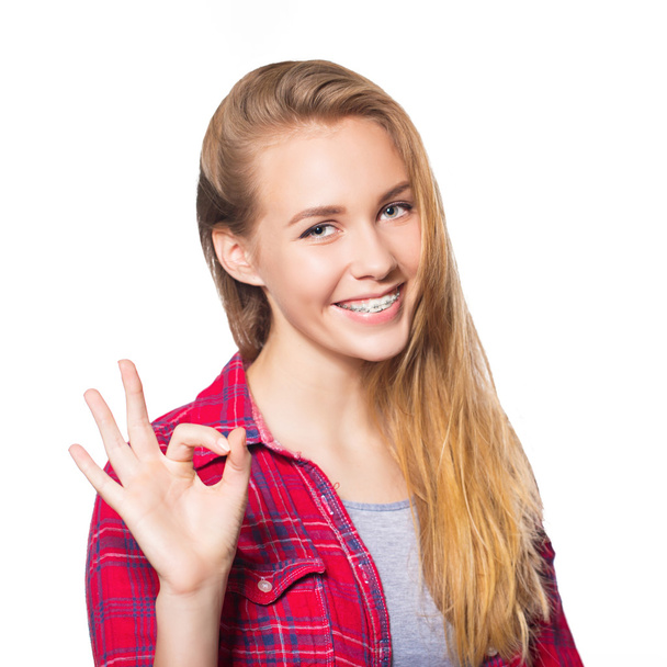 Portrait of teen girl showing dental braces. - Foto, Bild