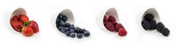 horizontal collection of berries in bowls - Foto, imagen
