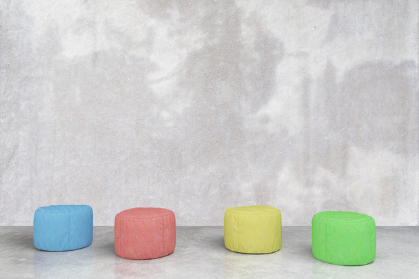Padded stools in concrete room - Foto, imagen