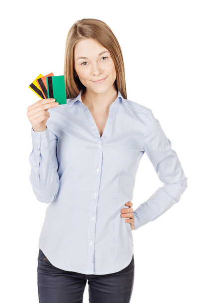 portrait of young smiling business woman holding credit card. isolated on white background. technology, shopping, banking and lifestyle concept - 写真・画像