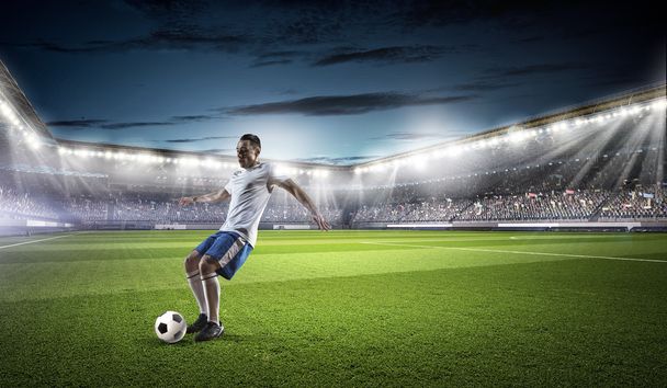 Soccer player hitting ball - Photo, Image