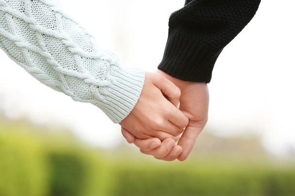 Loving couple holding hands  - Photo, Image