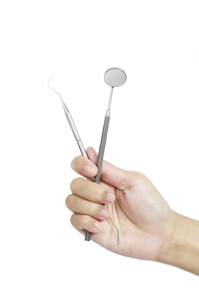 Hand with metal medical equipment tools for teeth dental care - Fotoğraf, Görsel