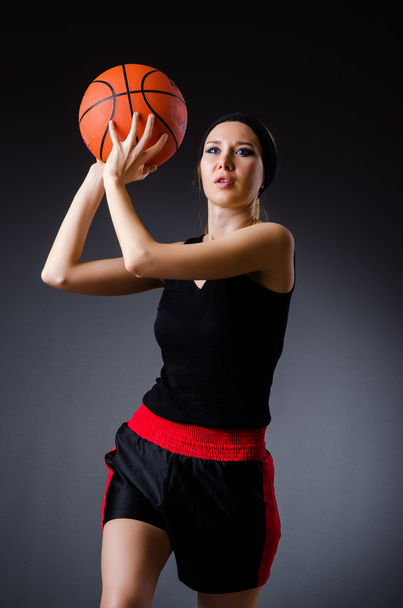 Woman with basketball in sport concept - Fotó, kép