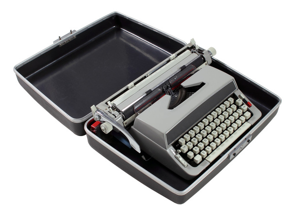 eine Retro-Schreibmaschine im Etui auf weißem Papier - Foto, Bild