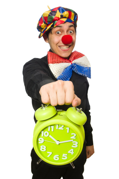 Funny clown with clock isolated on white - Fotoğraf, Görsel