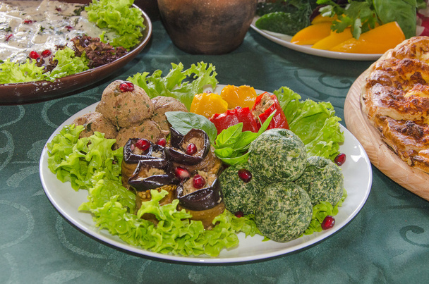 Georgian cuisine on a green background - Photo, Image