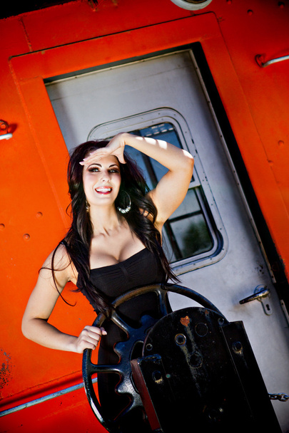 Gorgeous woman looking out from a train - Photo, Image