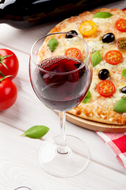 Glass of red wine and italian pizza - Photo, image