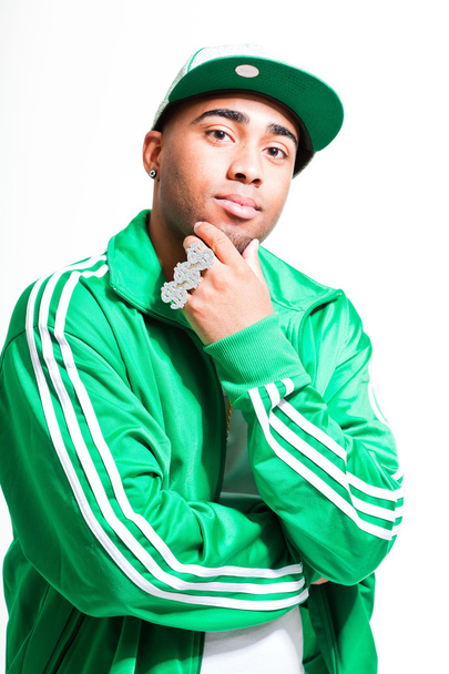 Hip hop urban black man wearing old school green suit and cap isolated on white. Looking confident. Cool guy. Studio shot. - Foto, imagen