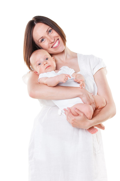 smiley νεαρή μητέρα και αξιολάτρευτο μωρό - Φωτογραφία, εικόνα