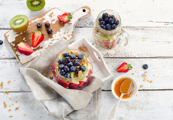 Breakfast with granola and berries - Fotó, kép