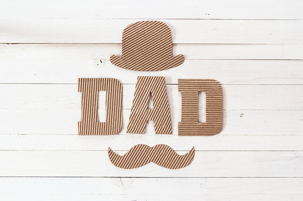Fathers day background with cardboard letters, hat and mustache. - 写真・画像