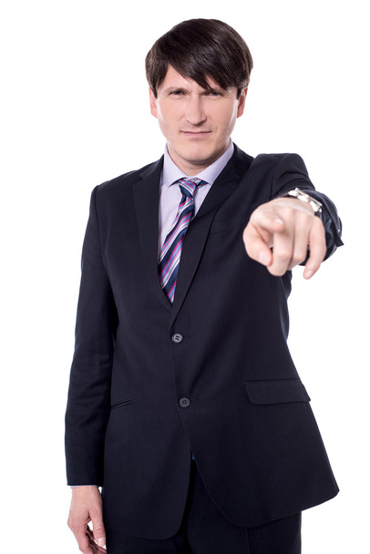businessman  looking and pointing finger  - Фото, зображення