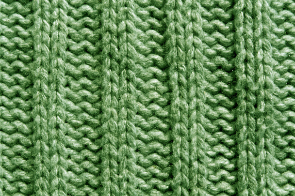 Абстрактна зелена текстура в'язання крупним планом
.  - Фото, зображення