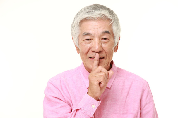 senior Japanese man whith silence gestures - Фото, изображение