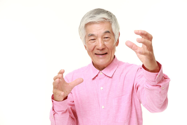 senior Japanese man with supernatural power - Фото, изображение
