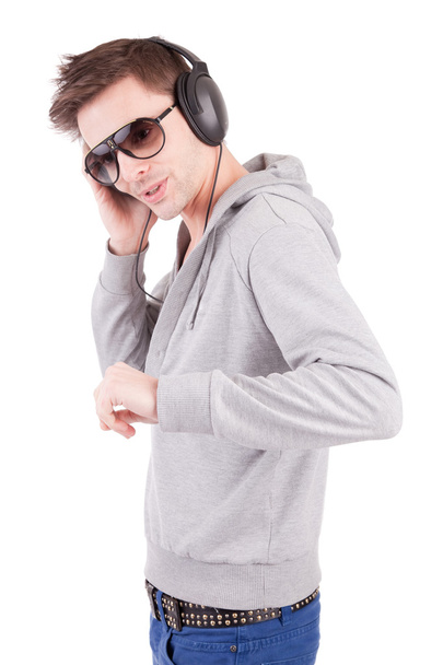 Young man listening to music - Foto, imagen