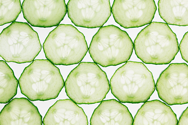 Cucumber slices. Pattern. Food background. Macro. Texture. - Фото, зображення