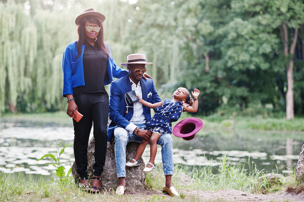 Stylish and rich african american family - 写真・画像