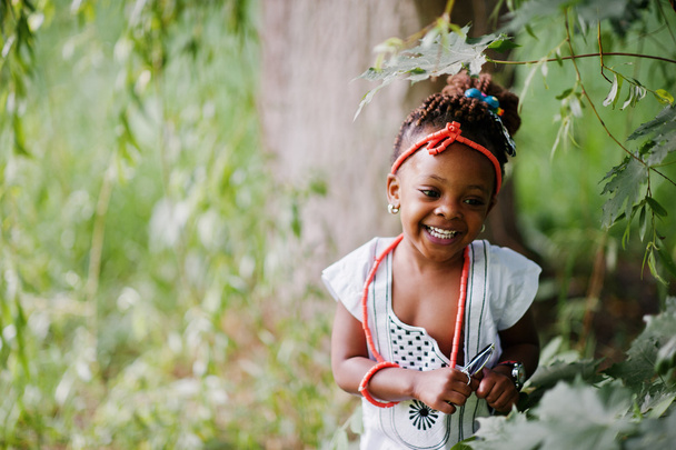 Amazing beautiful african american baby girl with sunglasses hav - Фото, зображення