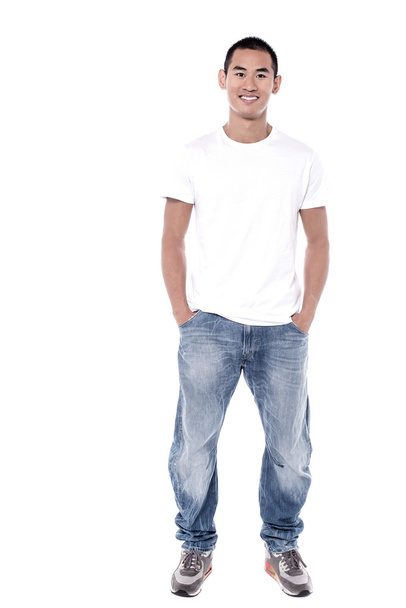 Smiling young man standing  - Foto, immagini