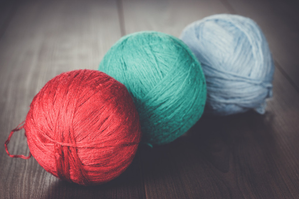 three knitting balls of threads - Foto, imagen