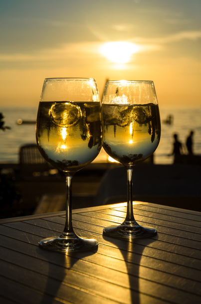two glasses of wine and sunset - Photo, Image
