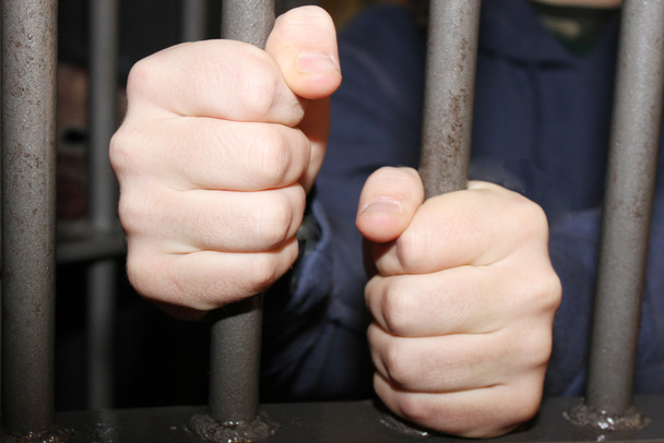 Man behind bars - Fotó, kép