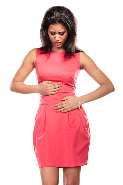 Woman suffering from stomach ache abdominal pain. - Фото, изображение