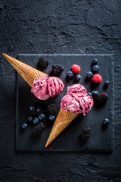 Tasty berry fruits ice cream and mint leaves - Zdjęcie, obraz
