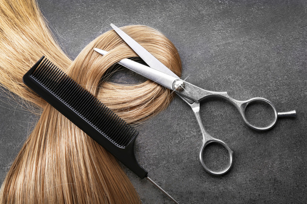 Hairdresser's scissors with  hair - Foto, Imagem