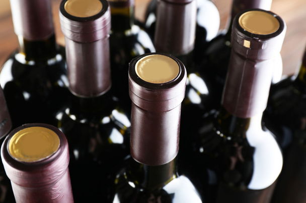 Stacks of wine bottles  - Photo, image