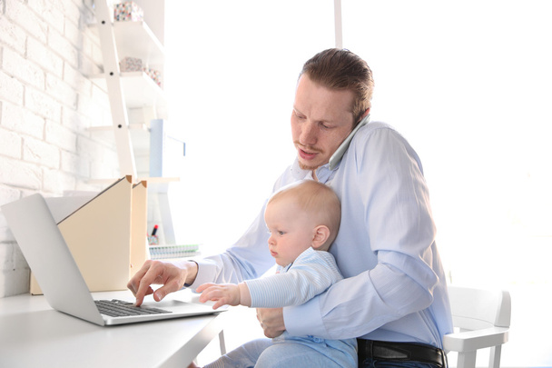 father with little son working - Photo, Image