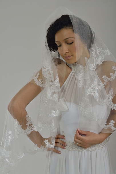 Portrait of a beautiful woman dressed as a bride - 写真・画像