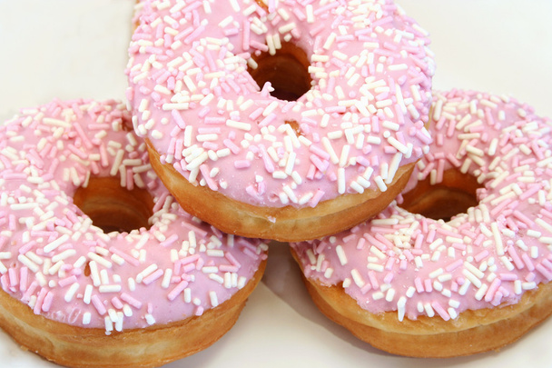 drei eisgekühlte Donuts - Foto, Bild