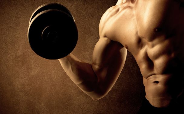 Musclé fit bodybuilder athlète poids de levage  - Photo, image