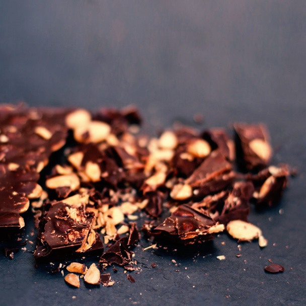 Chopped chocolate with nuts - 写真・画像
