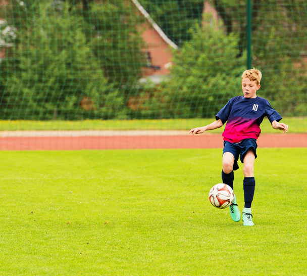 fiatal futballista - Fotó, kép